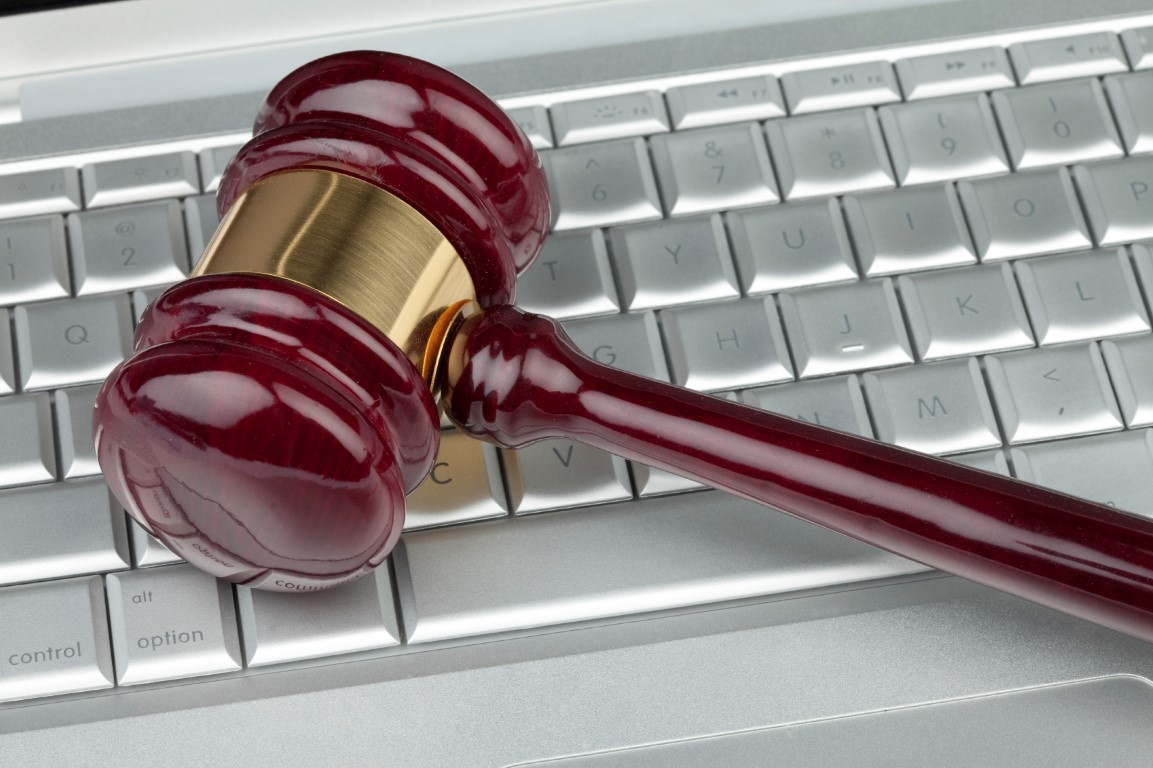 gavel on top of laptop